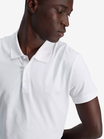 Футболка поло чоловіча Calvin Klein з логотипом біла 40QM223 фото